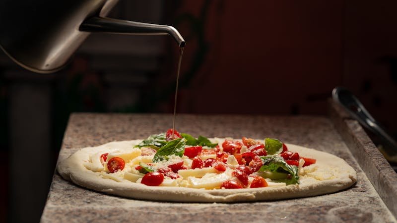 Margherita style pizza with fresh tomatoes and cheese