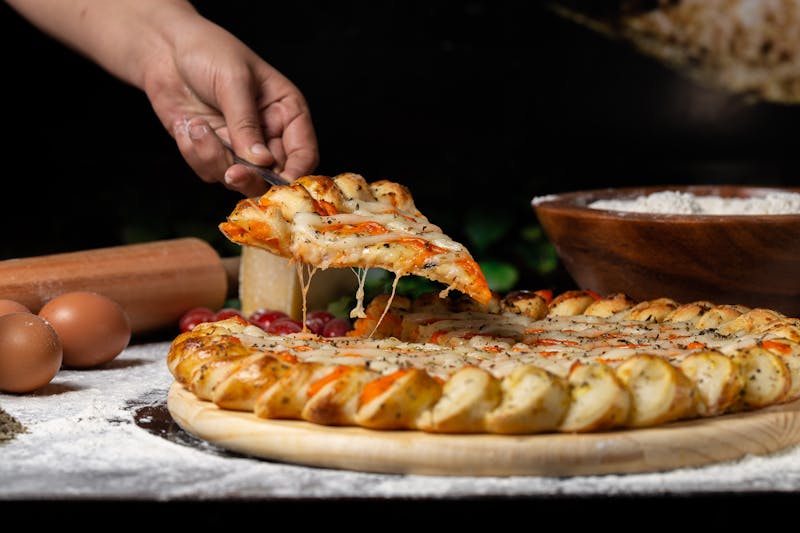 Calzone stuffed with cheese and meat toppings