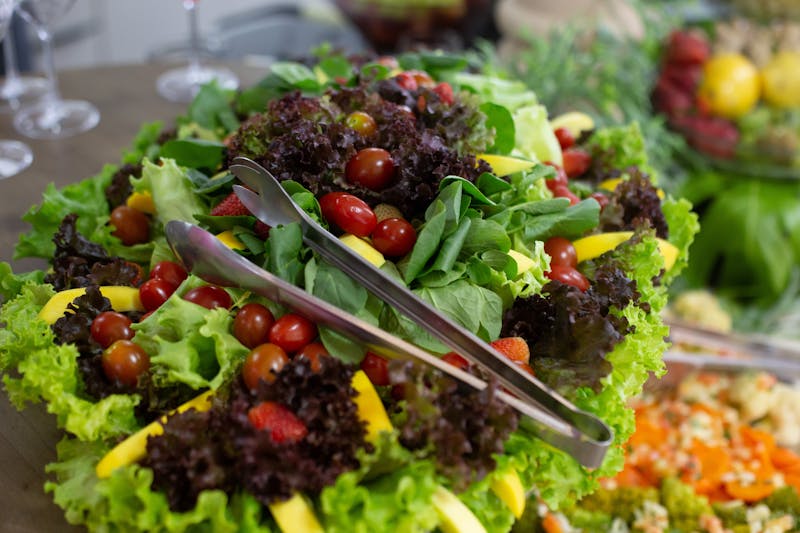Fresh garden salad with mixed vegetables and dressing